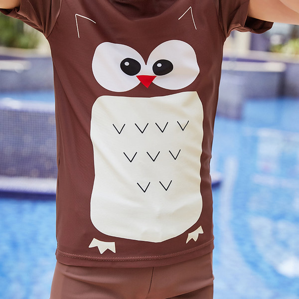 Pruuni värvi ja aplikatsiooniga laste täisujumistrikoo