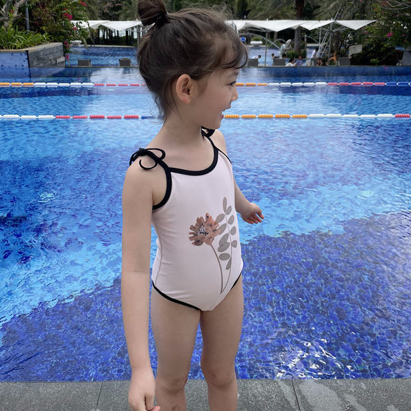 Gyermek fürdőruha fehér színben és rátéttel