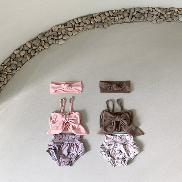 Lillemustriga laste ujumisriided tüdrukutele