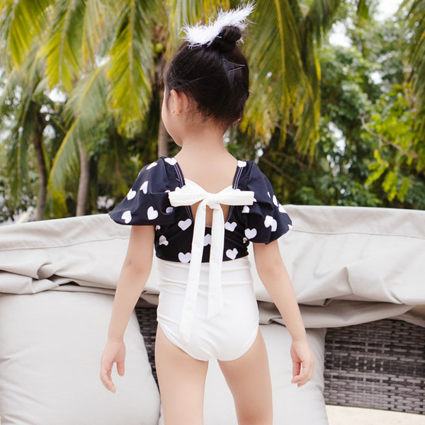 Teljes fürdőruha nyakkendős lányoknak