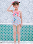 Teljes fürdőruha lányoknak szalaggal