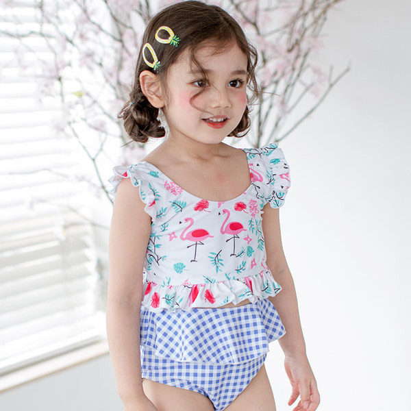 Gyermek teljes fürdőruha fürtökkel lányoknak