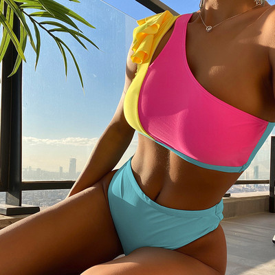 Női fürdőruha kék és rózsaszín színben, két részből áll