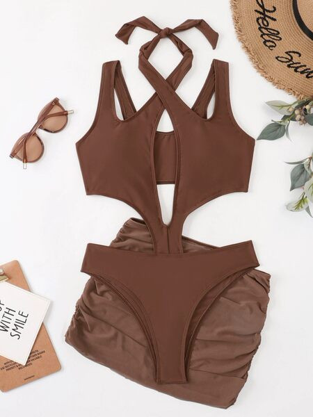 Női teljes fürdőruha kivágott részekkel barna színben