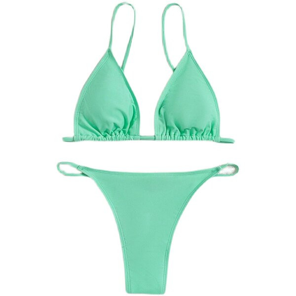 Erősen szabott női fürdőruha fém díszítéssel