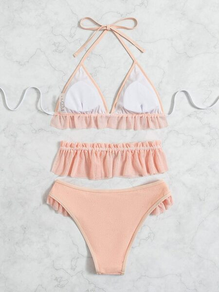 Modern női fürdőruha fürtökkel