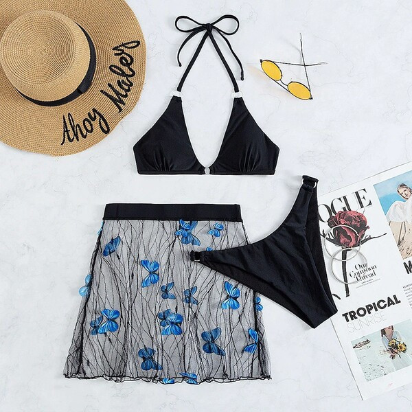 Moodne musta värvi naiste ujumistrikoo