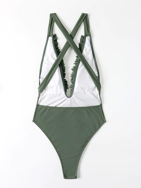 Egy egész női fürdőruha mély nyakkivágással és fürtökkel