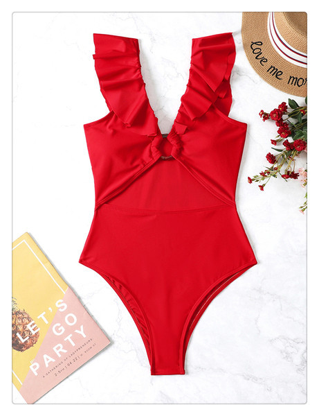 Divatos fürdőruha műanyag karikával és fürtökkel