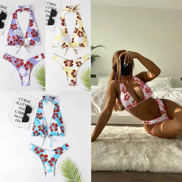 Naiste kaheosaline lipsude ja lillemotiividega ujumistrikoo