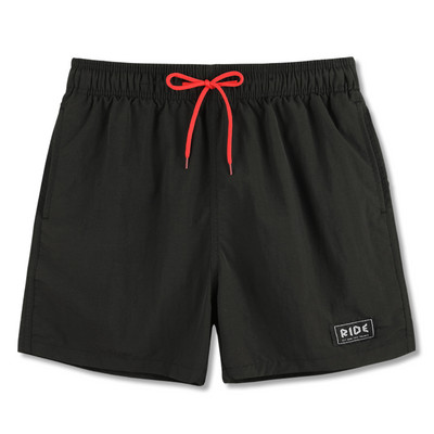 Strandra alkalmas rövidnadrág nyakkendővel és emblémával - férfiaknak