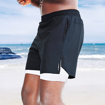 Taskutega ja elastse vöökohaga meeste ujumispüksid