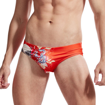 Lillemustriga meeste ujumistrikoo tüüpi põlvpüksid