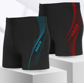 Meeste ujumistrikoo musta kirjaga