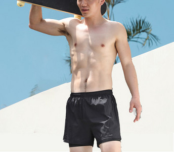 Meeste lühikesed lipsude ja lukuga taskutega rannapüksid