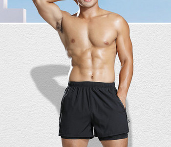 Meeste lühikesed lipsude ja lukuga taskutega rannapüksid