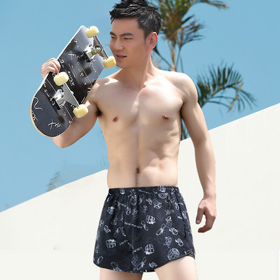 Meeste lühikesed lipsude ja lukuga taskutega rannapüksid