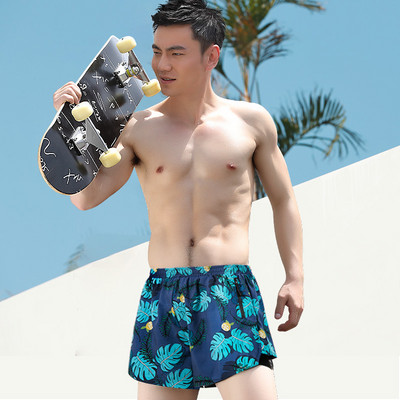 Meeste lühikesed lipsude ja lukuga taskutega rannapüksid