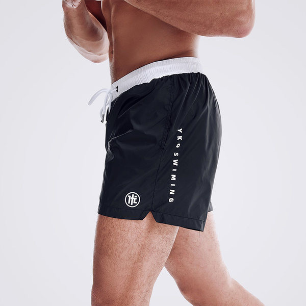 Laiad meeste lühikesed rannapüksid lipsude ja kirjaga