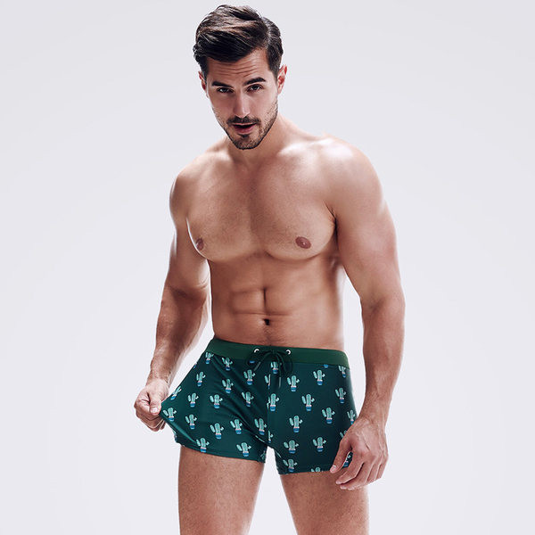 Aplikatsiooniga meeste ujumisriided - musta ja rohelist värvi