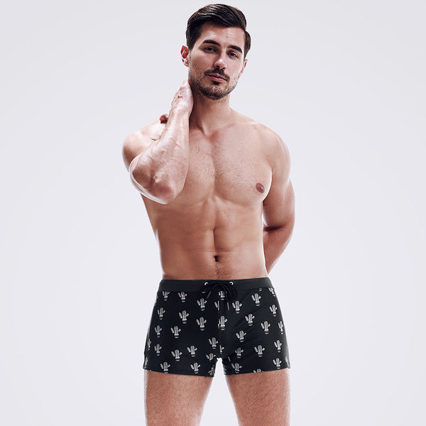 Aplikatsiooniga meeste ujumisriided - musta ja rohelist värvi