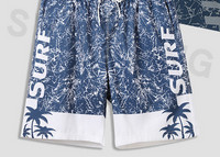 Värvilise aplikatsiooniga randa sobivad meeste vabad lühikesed püksid