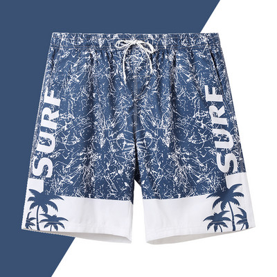 Värvilise aplikatsiooniga randa sobivad meeste vabad lühikesed püksid