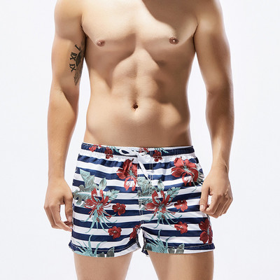 Värvilised lillemotiivide ja lipsudega meeste ujumisriided