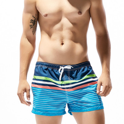 Värvilised lillemotiivide ja lipsudega meeste ujumisriided