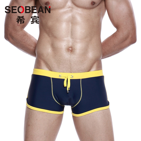 Lihtne mudel meeste ujumistrikoo lipsudega ja madala vöökohaga