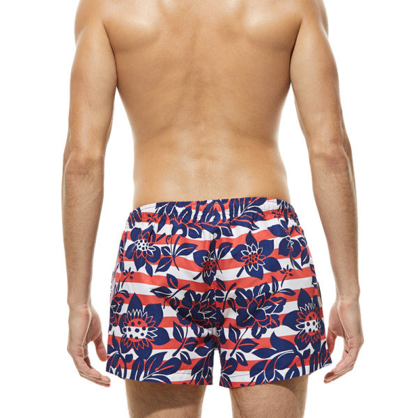 Värvilised lipsude ja lillemotiividega meeste rannapüksid