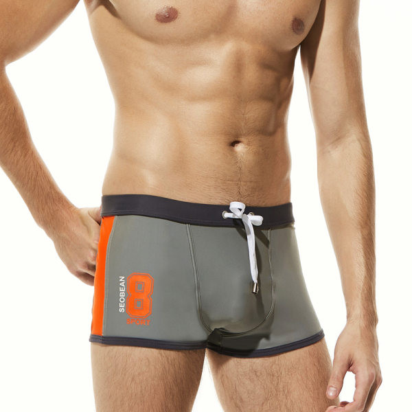 Férfi úszó boxer felirattal és nyakkendővel