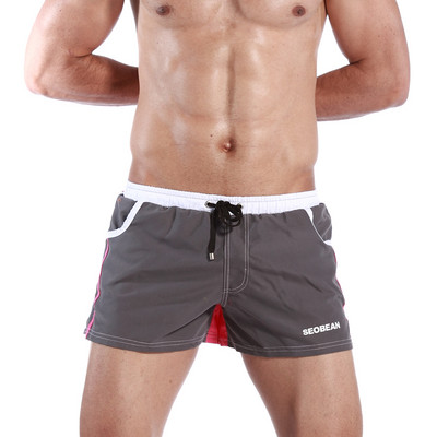 Lühikesed lipsudega ujumispüksid