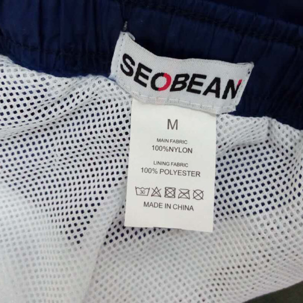 Meeste madala vöökoha ja lipsudega ujumistrikoo lühikesed püksid