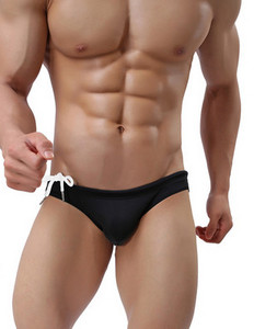 Kiiresti kuivavad küljesidemetega meeste ujumistrikoo tüüpi püksikud