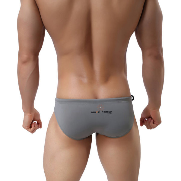 Kiiresti kuivavad küljesidemetega meeste ujumistrikoo tüüpi püksikud