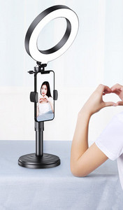 Selfie stick ar apgaismojumu - dažādi modeļi