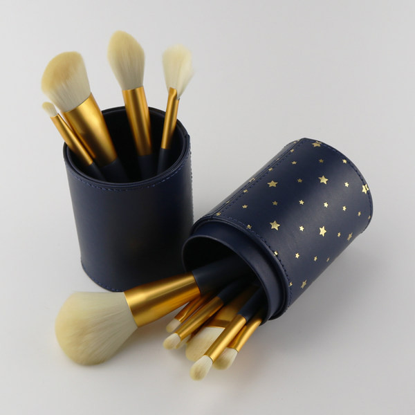 Κυλινδρικό κουτί από οικολογικό δέρμα για την αποθήκευση πινέλων μακιγιάζ