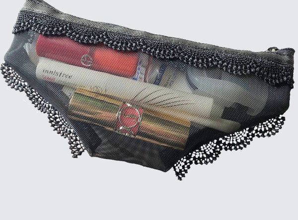 Prozirna toaletna torbica s vezom pogodna za odlaganje šminke