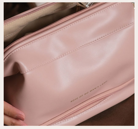 Prijenosna kožna kozmetička torbica pogodna za odlaganje šminke