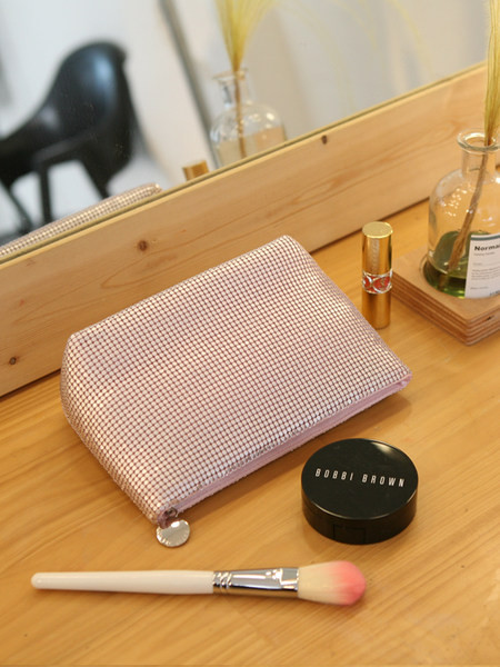 Tekstilni pribor za šminkanje s efektom sjaja