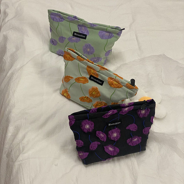 Mali tekstilni set za šminkanje s cvjetnim uzorkom