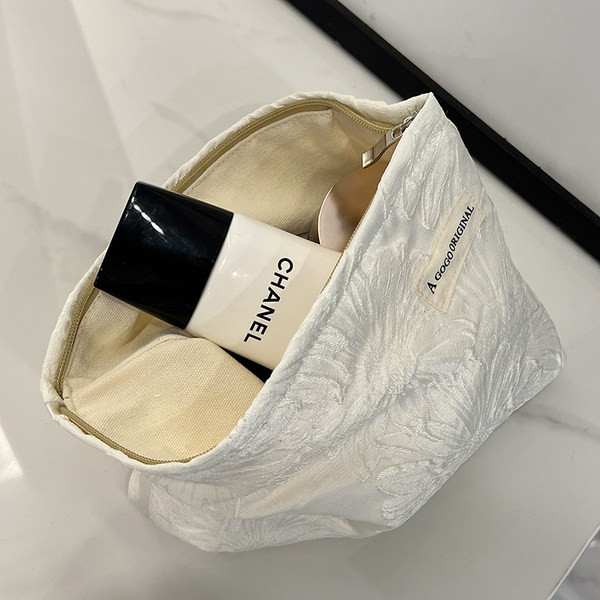 Tekstilna kozmetička torbica s vezom za pohranu šminke