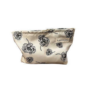Υφασμάτινη τσάντα μακιγιάζ με λουλουδάτο μοτίβο