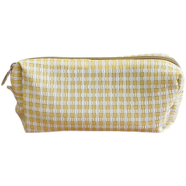 Tekstilna kockasta torbica pogodna za odlaganje šminke