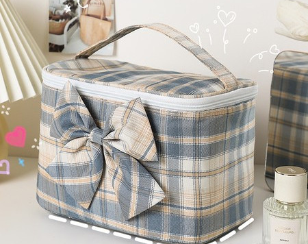 Kozmetička tekstilna torbica za šminku s vrpcom