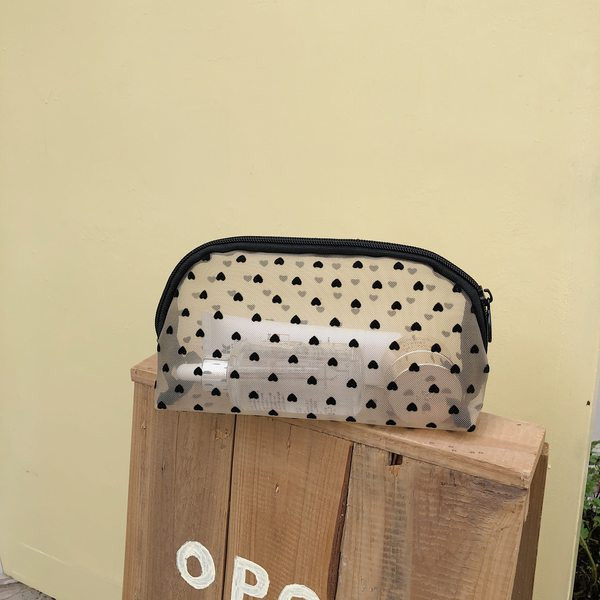Kozmetička torbica u obliku srca