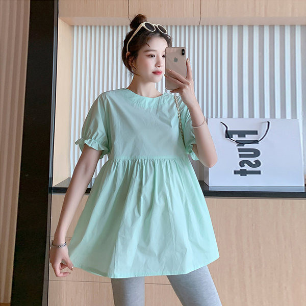 Novi model ženske bluze sa ovalnim izrezom za trudnice