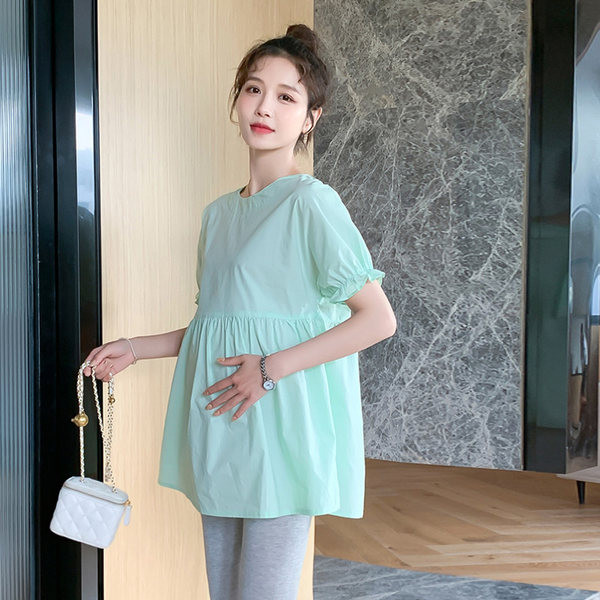 Novi model ženske bluze sa ovalnim izrezom za trudnice