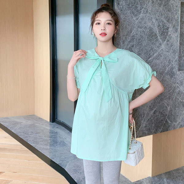 Novi model ženske bluze sa ovalnim izrezom za trudnice